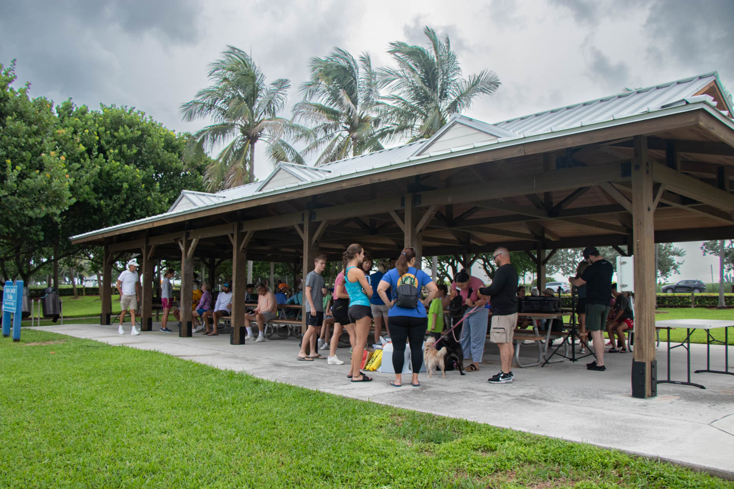 Volunteers standing under Anita Lankler Pavilion.