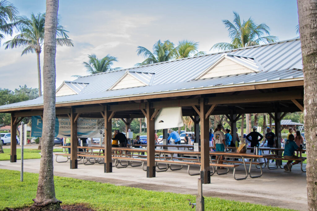 People under beach pavilion in Ocean Cay Park, Jupiter, Fl.