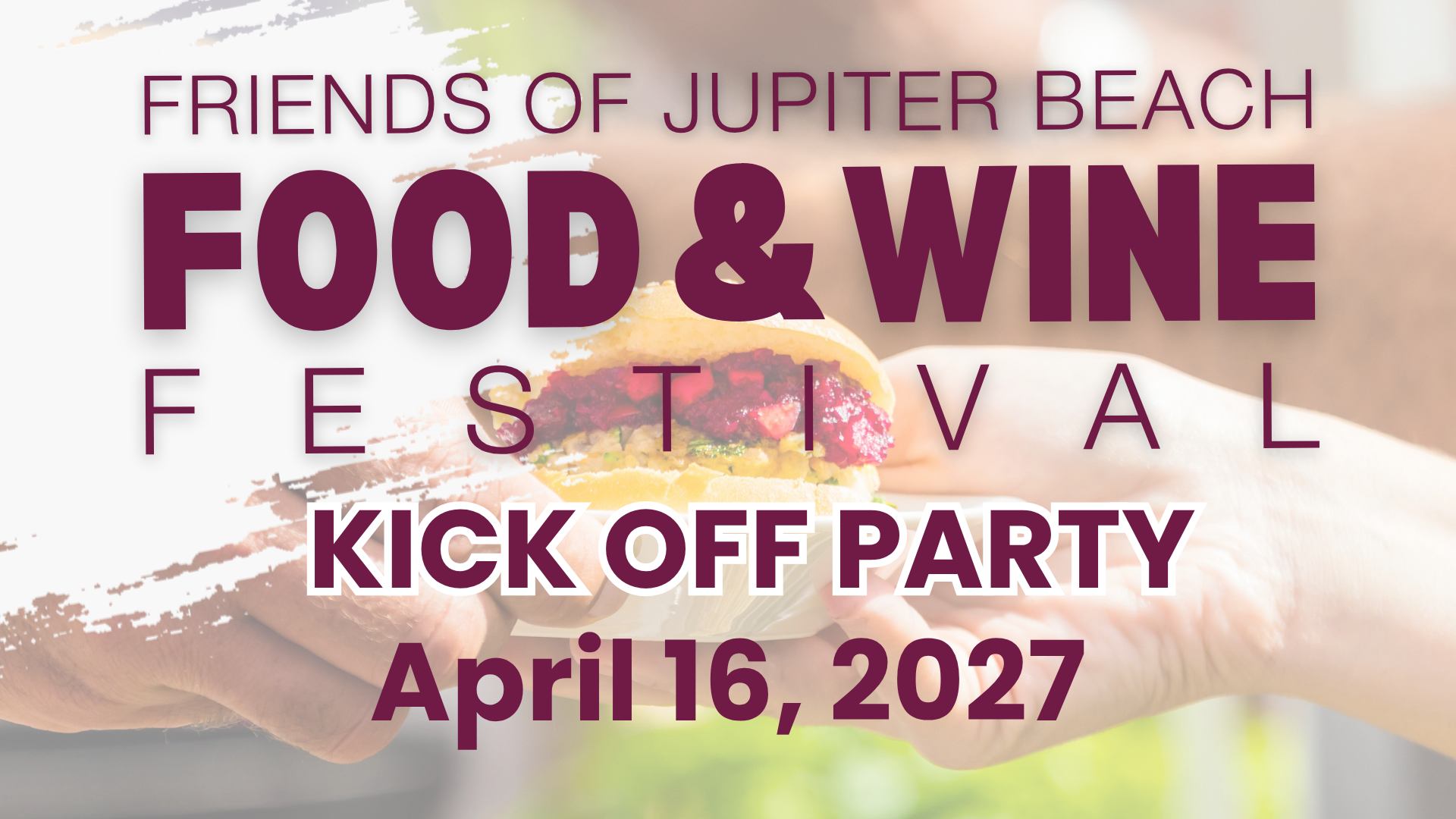 sandwich on a plate being handed to someone linking to a webpage with details of the food and wine festival